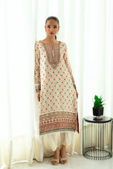 Cream 2-piece silk suit featuring delicate floral embroidery on the kurta.