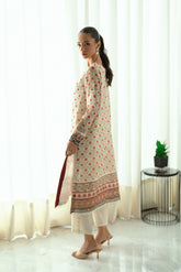 Cream 2-piece silk suit featuring delicate floral embroidery on the kurta.