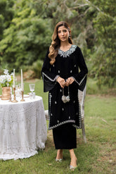 FW25DA-2833 Classic black velvet kurta with intricate silver embroidery on the borders and neckline, paired with solid black pants.