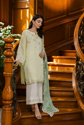 Pastel yellow 3-piece silk suit with delicate embroidery and wide-leg trousers.