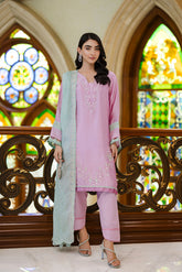 Lilac 3-piece luxury silk ensemble with intricate floral embroidery and seafoam green dupatta.