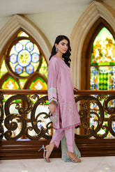 Lilac 3-piece luxury silk ensemble with intricate floral embroidery and seafoam green dupatta.