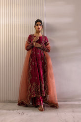 Vibrant dark pink festive 3-piece suit with heavy embellishments and luxury dupatta.