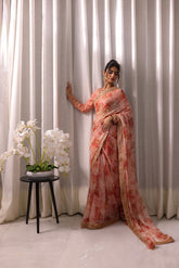 Timeless peach embroidered saree with luxury adda work and embellished blouse.