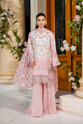 Feminine pink 2-piece silk tunic featuring blooming floral accents and matching flared solid trousers.