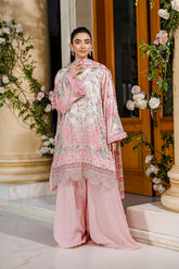 Feminine pink 2-piece silk tunic featuring blooming floral accents and matching flared solid trousers.