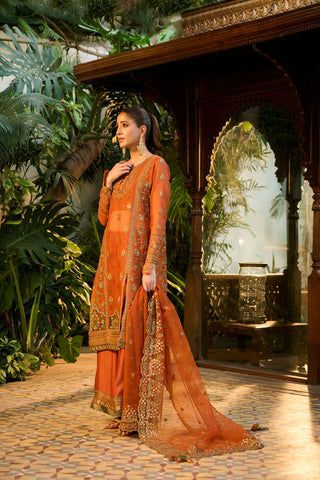Traditional rust embroidered 3-piece formal outfit from the Alaya couture collection.