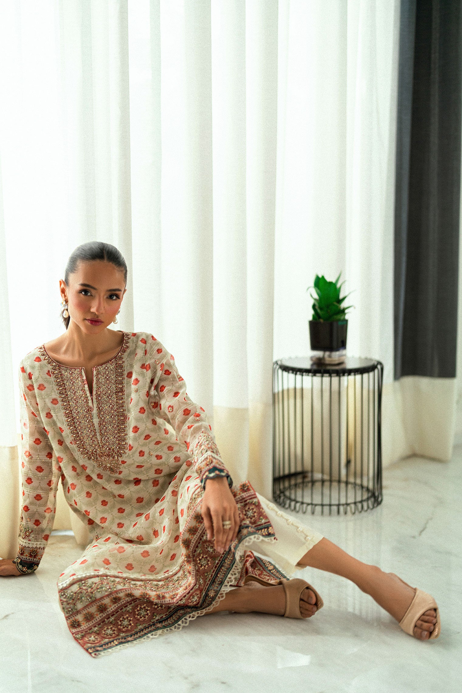 Cream 2-piece silk suit featuring delicate floral embroidery on the kurta.