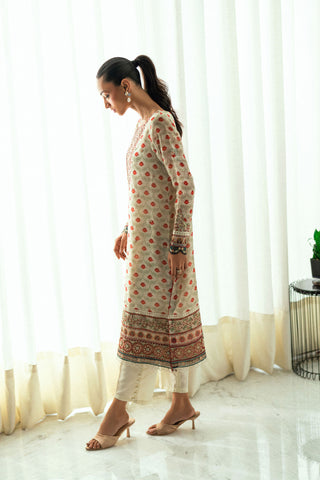 Cream 2-piece silk suit featuring delicate floral embroidery on the kurta.