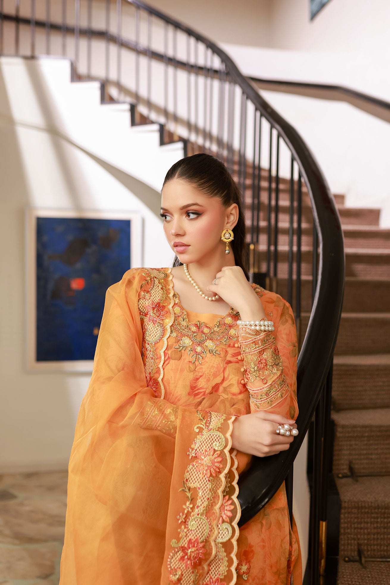 SS25DA-2716 Orange 2-piece printed chiffon kurta with floral embroidery and lace detailing on daman and sleeves.