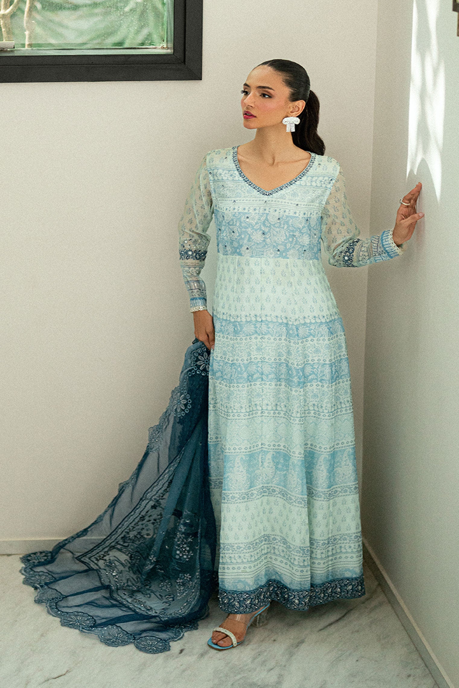 Sky blue 2-piece silk suit with delicate floral embroidery and straight pants.
