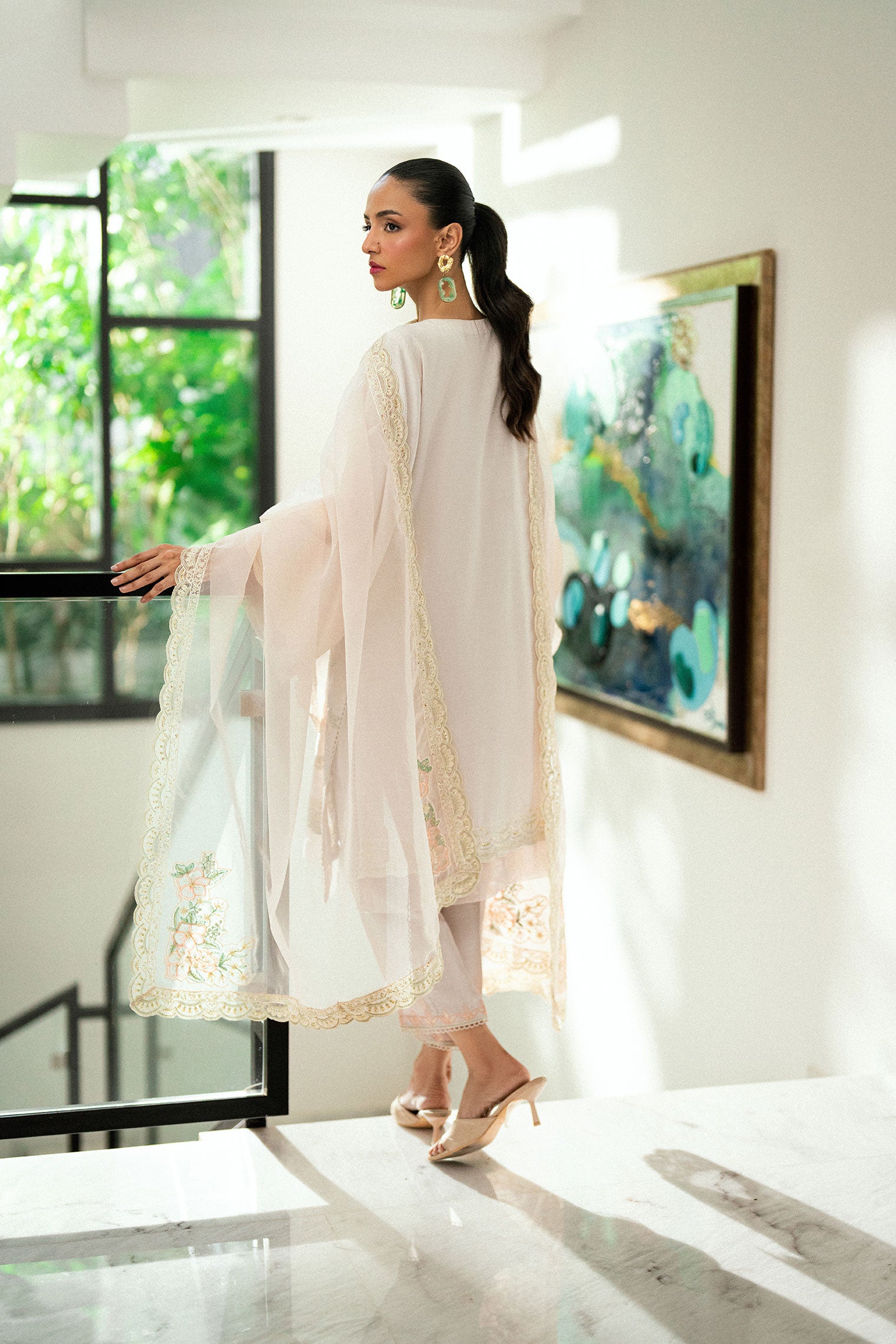 Tea pink 2-piece embroidered kurta with matching trousers and lace accents.