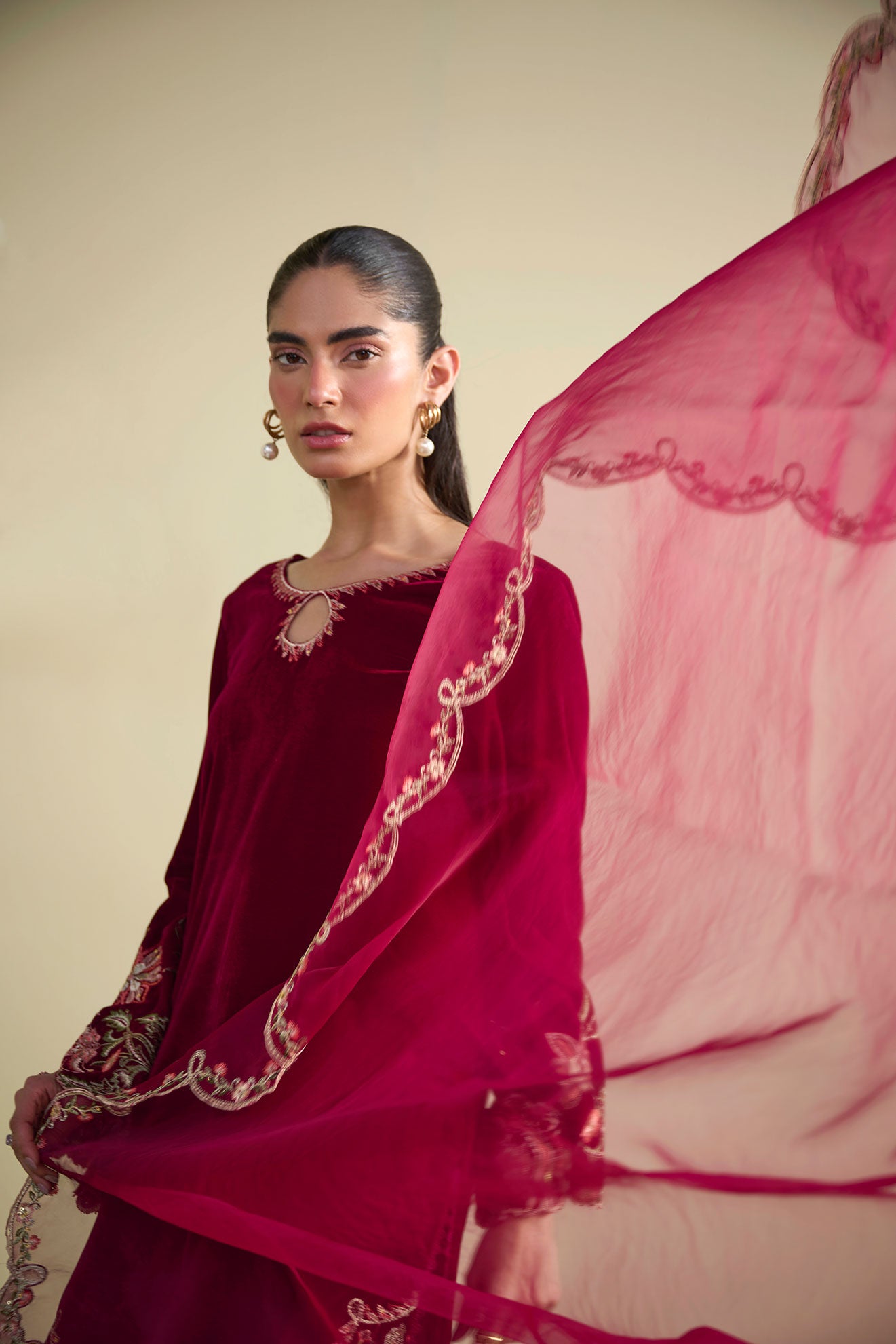 FW25DA-2804 Velvet ensemble in red with gold embroidery on keyhole neckline and cuffs.