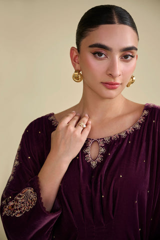 FW25DA-2806 Jewel-toned magenta velvet kaftan with gold craftsmanship on cuffs and neckline.
