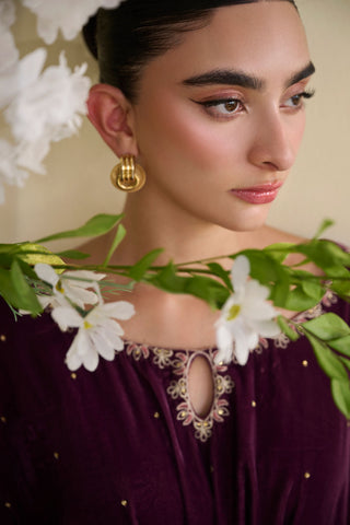 FW25DA-2806 Jewel-toned magenta velvet kaftan with gold craftsmanship on cuffs and neckline.