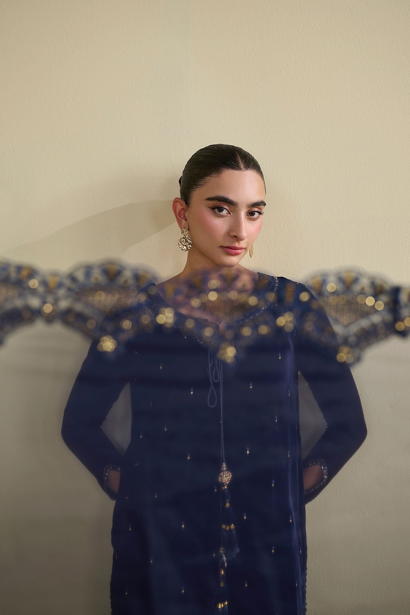 FW25DA-2810 Navy Blue 2-Piece: Enchanting navy velvet kurta adorned with golden embroidery, paired with matching embroidered trousers.