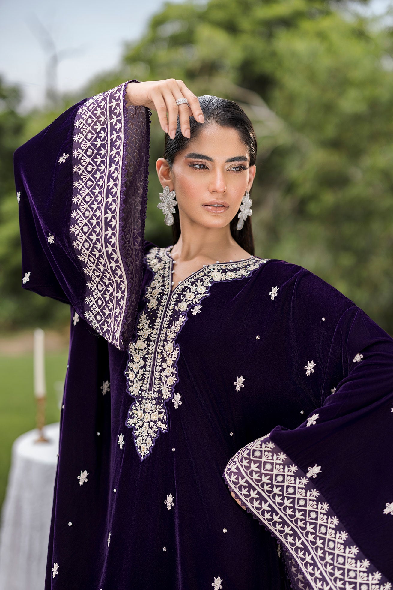 FW25DA-2818 Purple 2-Piece: Opulent plum velvet ensemble with majestic embroidery around the neckline and dramatic bell sleeves.