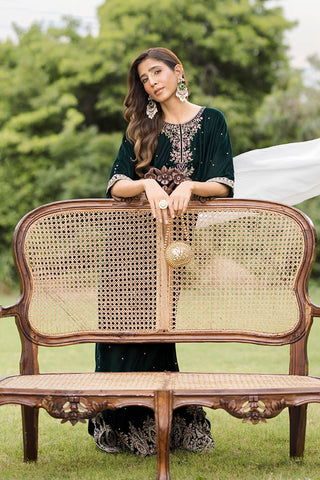 FW25DA-2829 Bottle Green Kaftan: Emerald velvet kaftan with gold and pink embroidery along the neckline and hem for a regal silhouette.