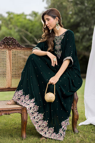 FW25DA-2829 Bottle Green Kaftan: Emerald velvet kaftan with gold and pink embroidery along the neckline and hem for a regal silhouette.