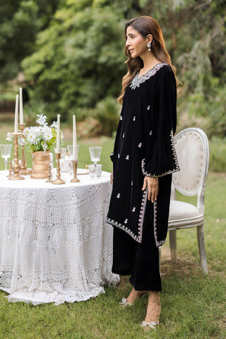FW25DA-2833 Classic black velvet kurta with intricate silver embroidery on the borders and neckline, paired with solid black pants.