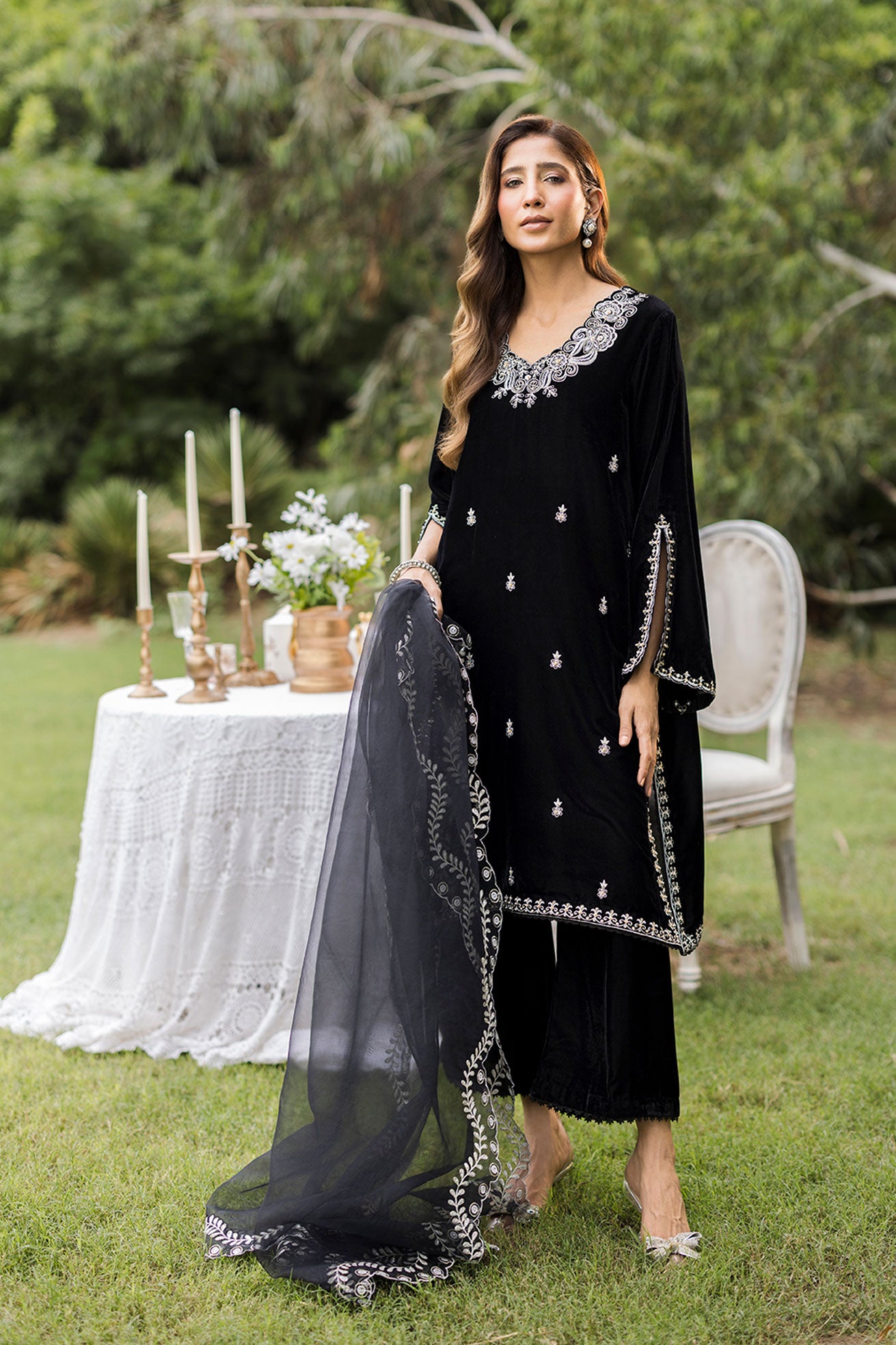 FW25DA-2833 Classic black velvet kurta with intricate silver embroidery on the borders and neckline, paired with solid black pants.