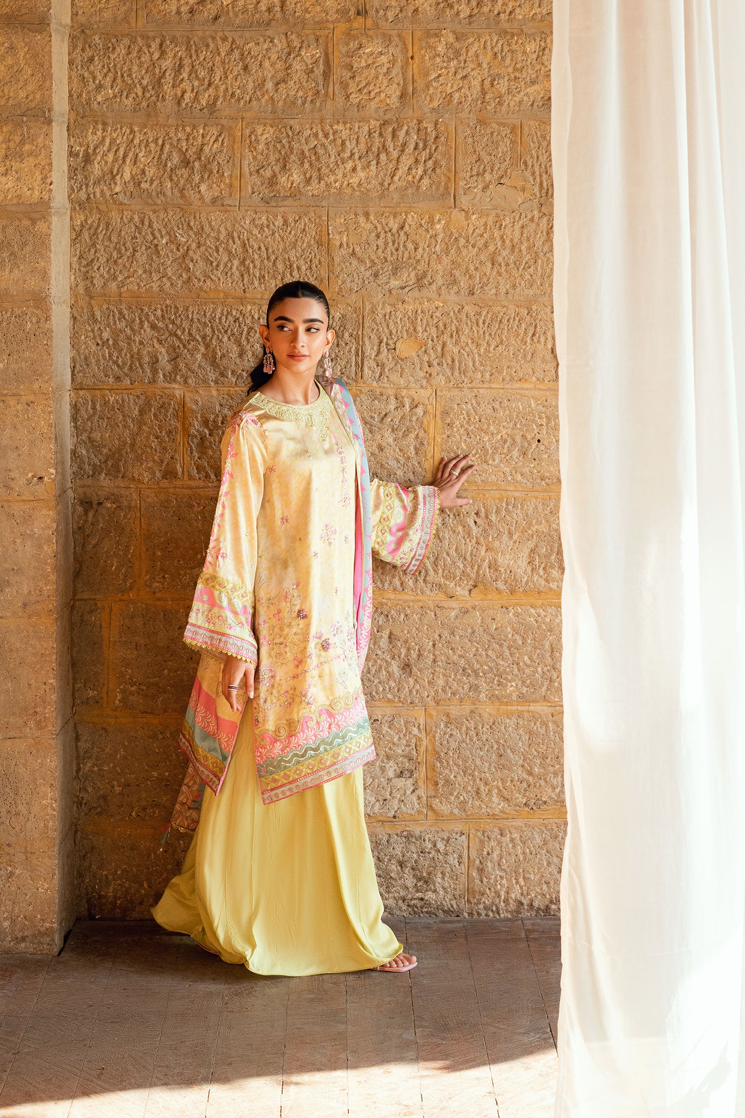 SS26DA-2892 Yellow 2-piece satin silk ensemble featuring a delicately floral-printed kurta with fine embroidery.