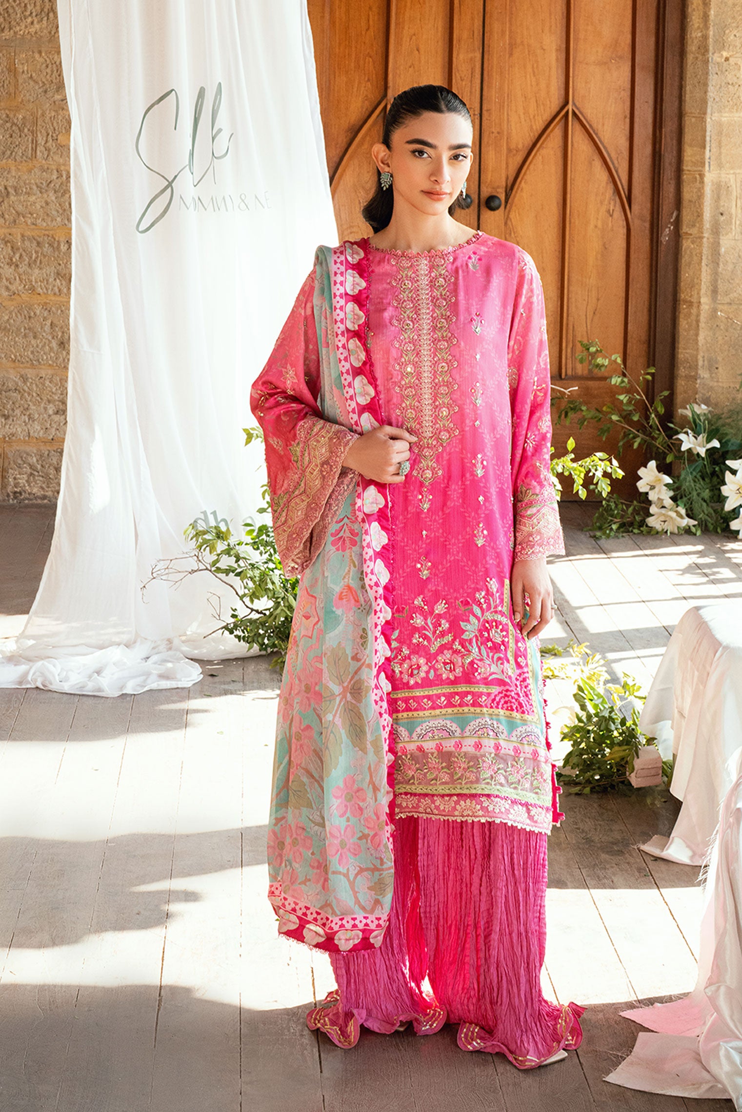 Pink 2-piece silk ensemble with hand-embellished kurta.