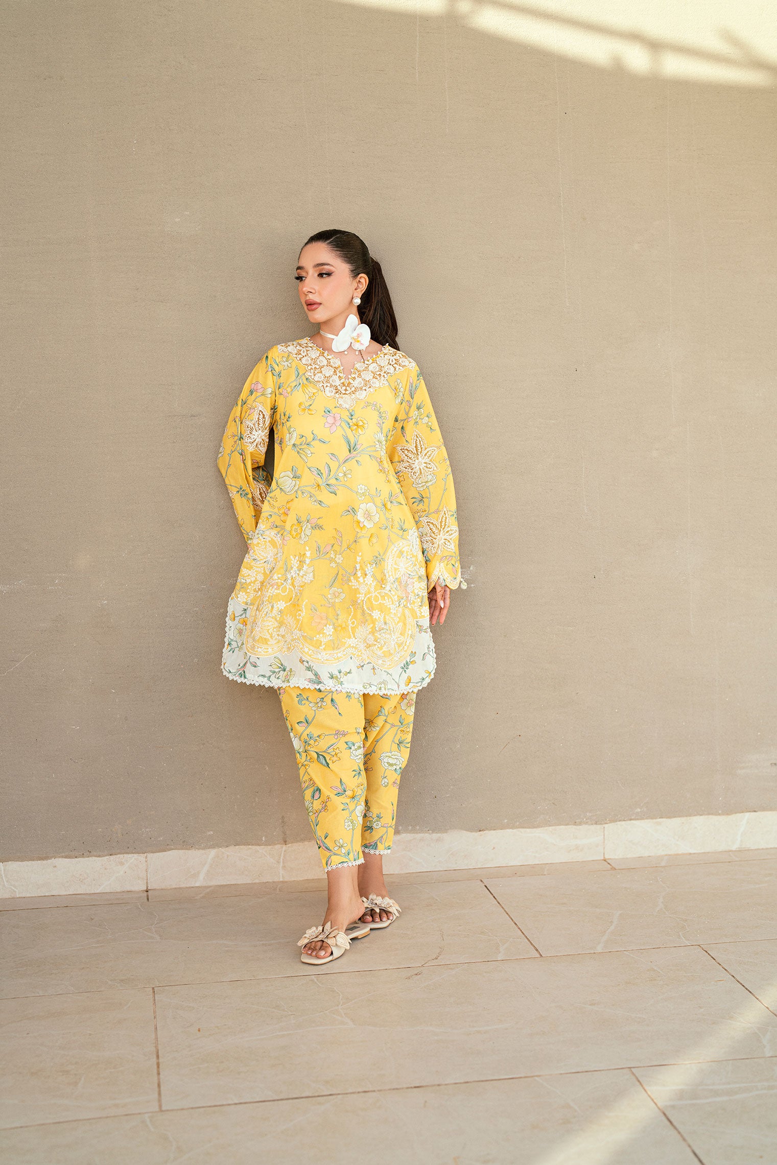 SS25DC-2534 Yellow 2-piece premium lawn ensemble with a printed shirt and delicate embroidery for a festive look.