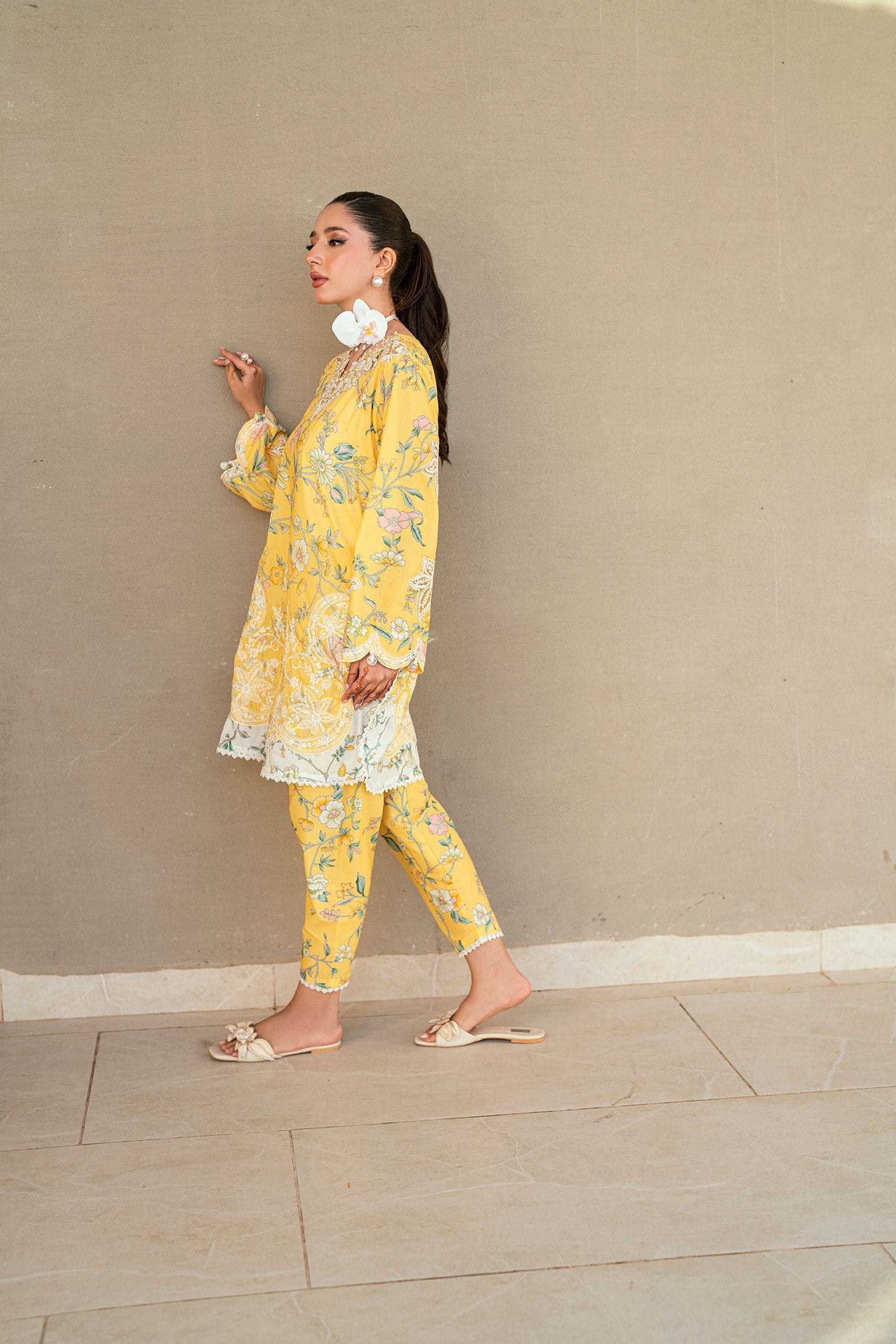 SS25DC-2534 Yellow 2-piece premium lawn ensemble with a printed shirt and delicate embroidery for a festive look.