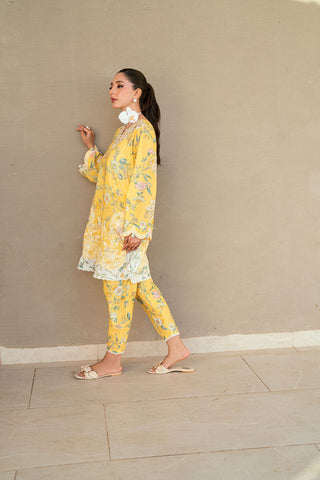 SS25DC-2534 Yellow 2-piece premium lawn ensemble with a printed shirt and delicate embroidery for a festive look.