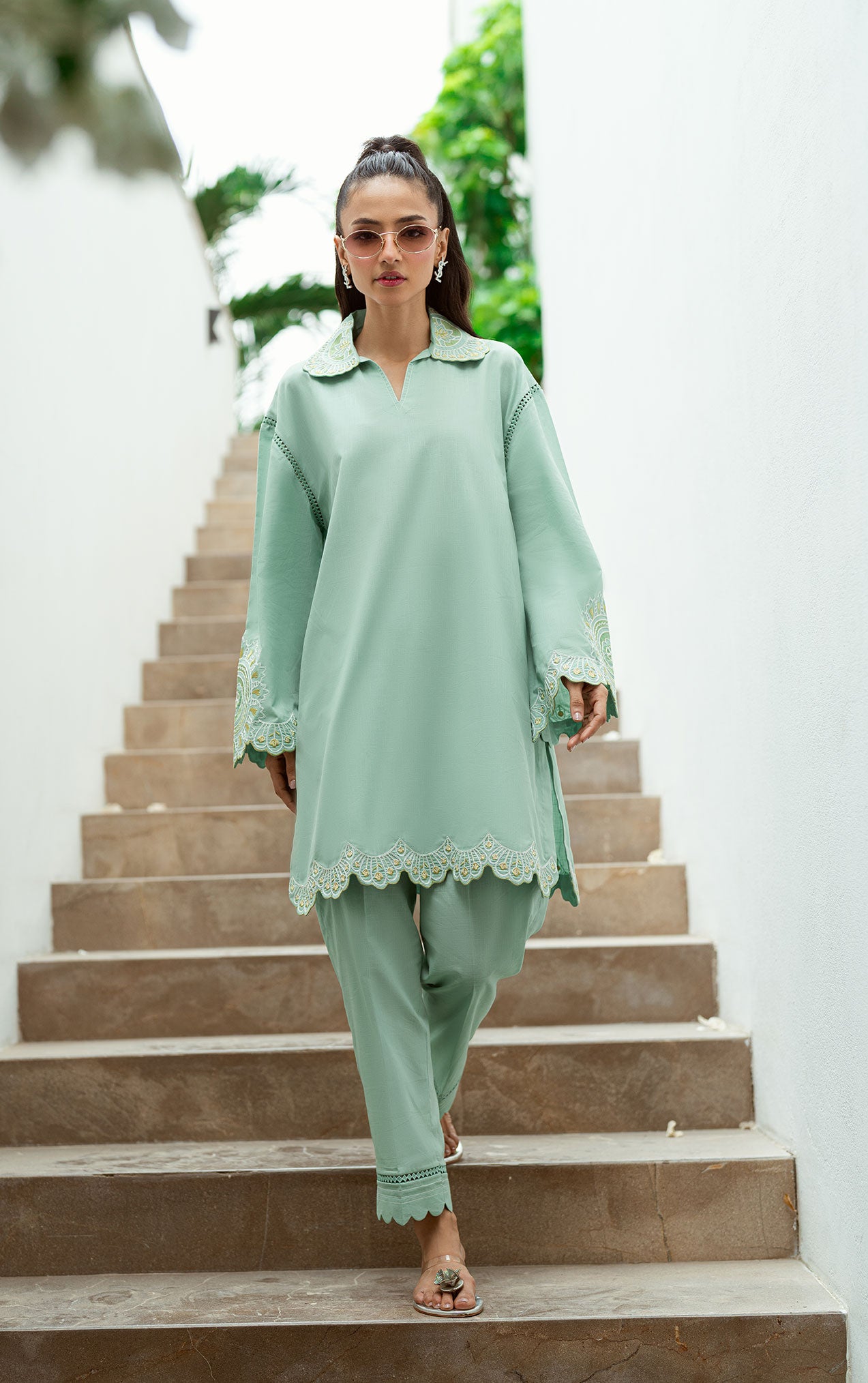 SS25DC-2569 Mint green 2-piece with intricate embroidery, cutwork hem, and scalloped pants.