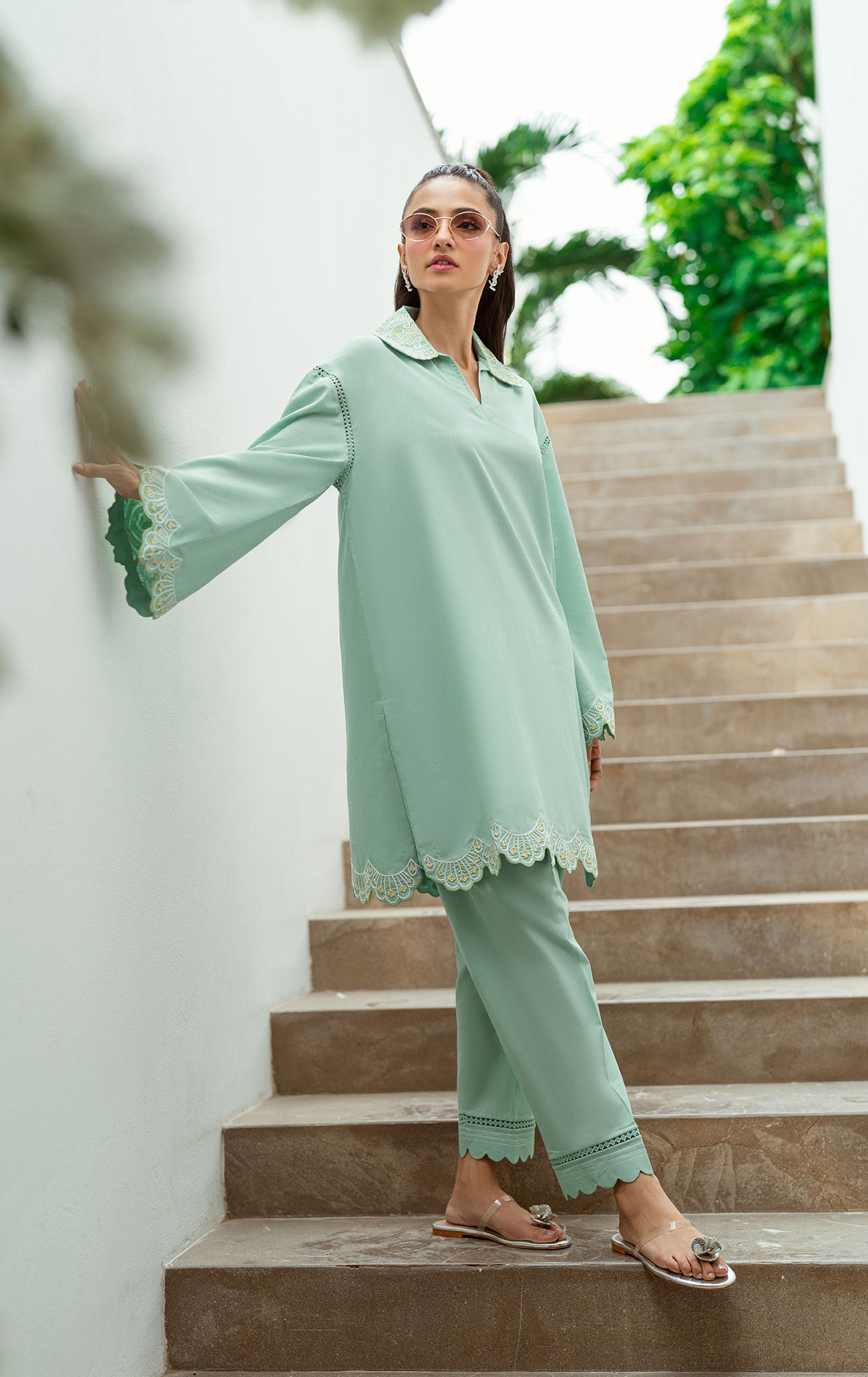 SS25DC-2569 Mint green 2-piece with intricate embroidery, cutwork hem, and scalloped pants.
