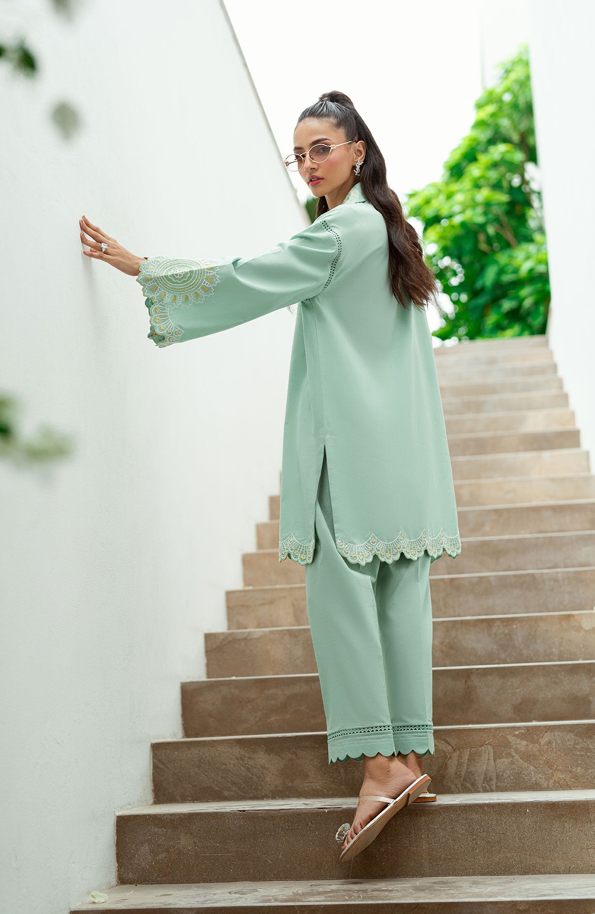 SS25DC-2569 Mint green 2-piece with intricate embroidery, cutwork hem, and scalloped pants.