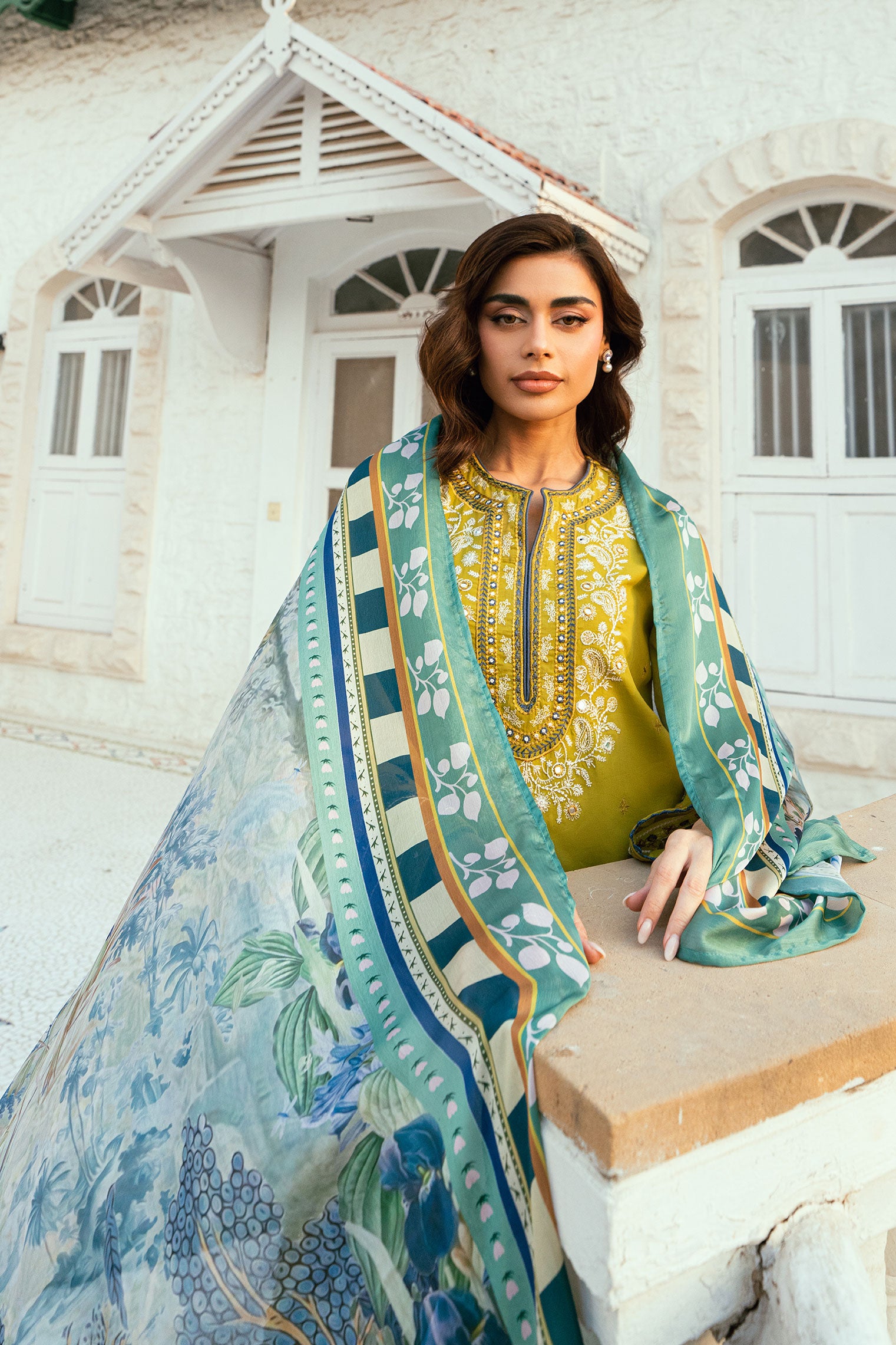 Olive Green 2-piece Swiss Voile ensemble with detailed embroidery on neck and sleeves - Dhanak SS26
