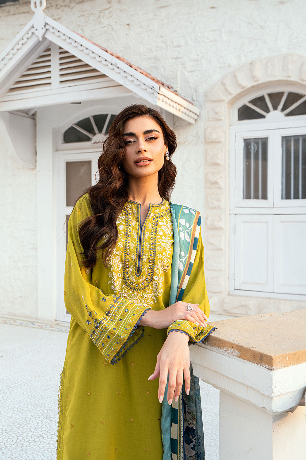 Olive Green 2-piece Swiss Voile ensemble with detailed embroidery on neck and sleeves - Dhanak SS26
