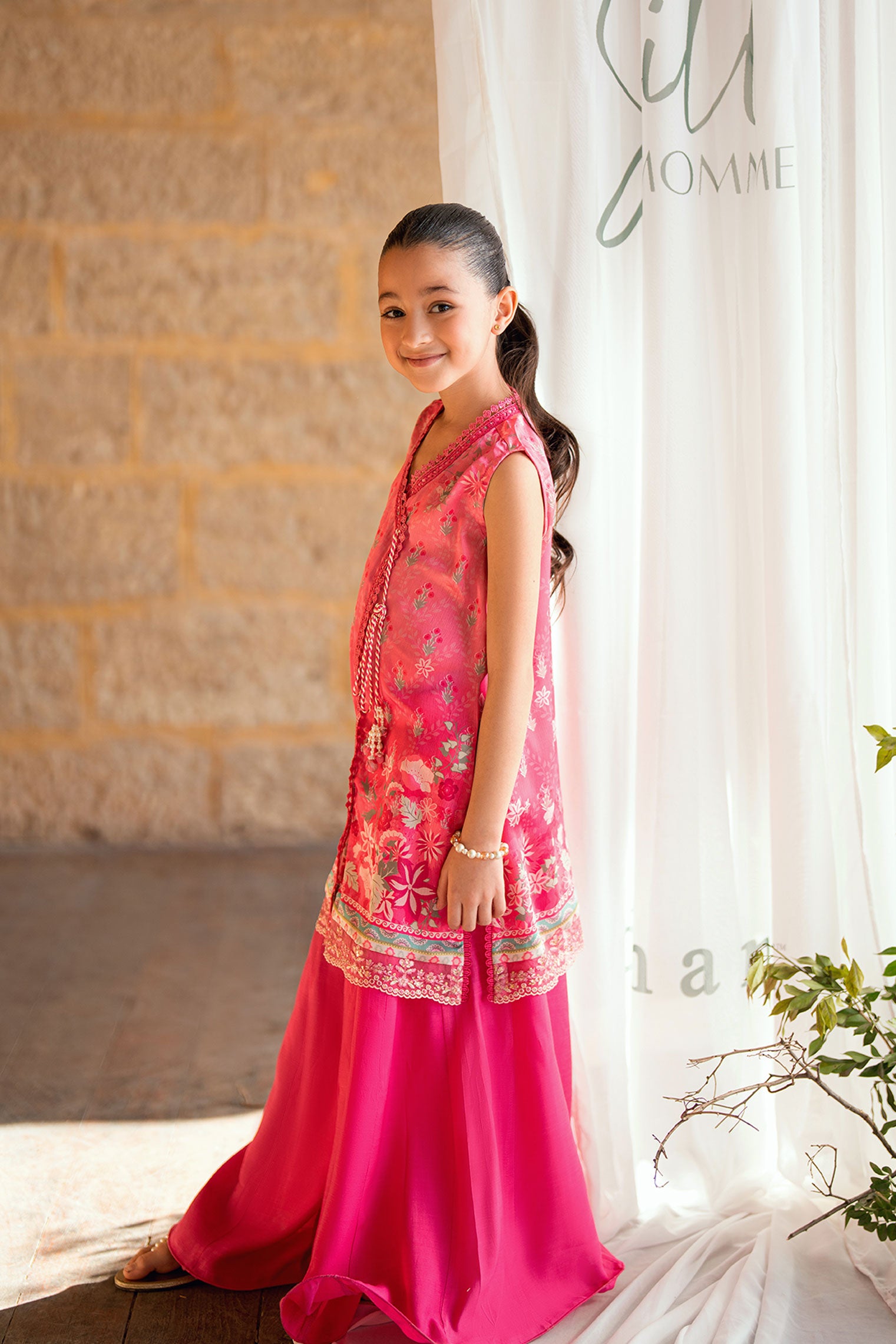 Kids pink 2-piece satin silk outfit with delicate embroidery.