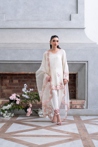 Off-white 3-piece cotton net ensemble with contrasting pink and green floral embroidery.