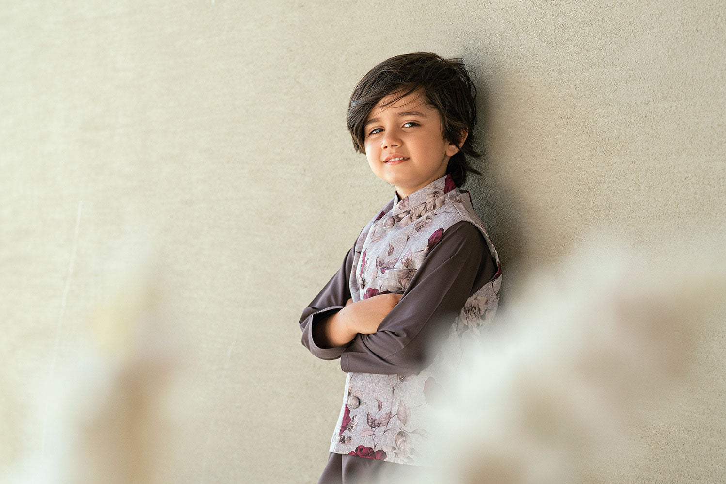 Boys dark grey kurta pajama with floral waistcoat.