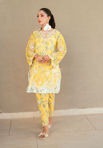 SS25DC-2534 Yellow 2-piece premium lawn ensemble with a printed shirt and delicate embroidery for a festive look.