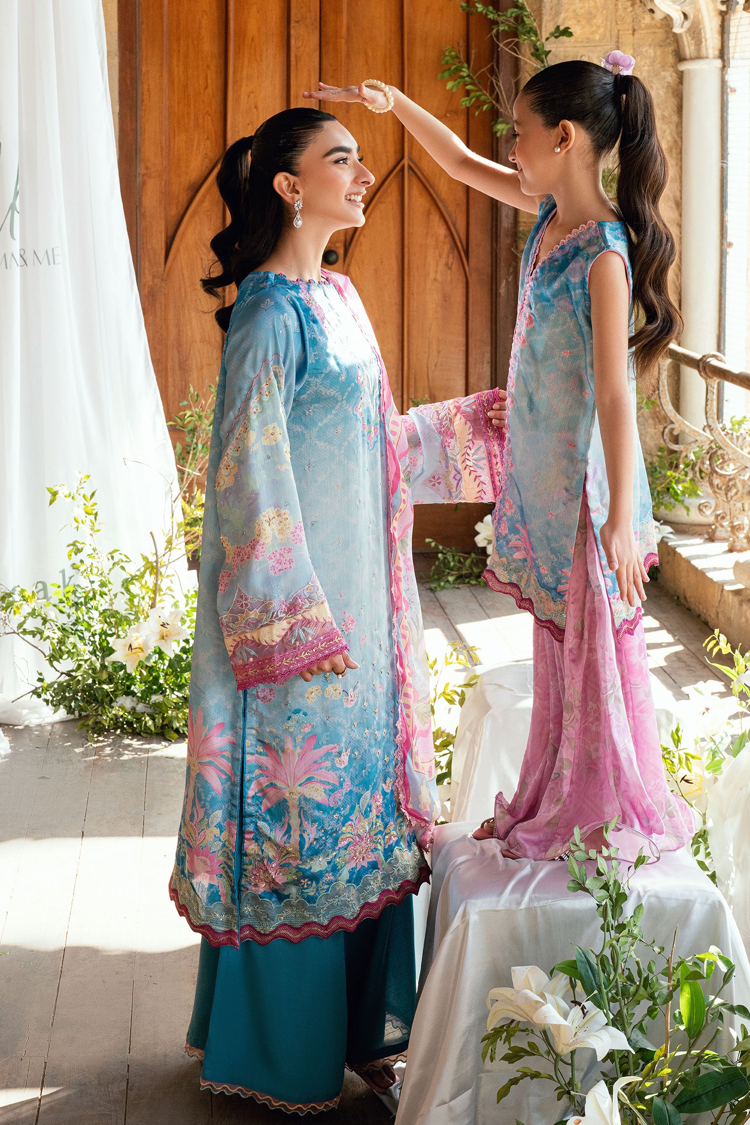 SS26DA-2898 Blue 2-piece satin silk ensemble featuring delicate embroidery over a soft print and flared pants with lace hem.