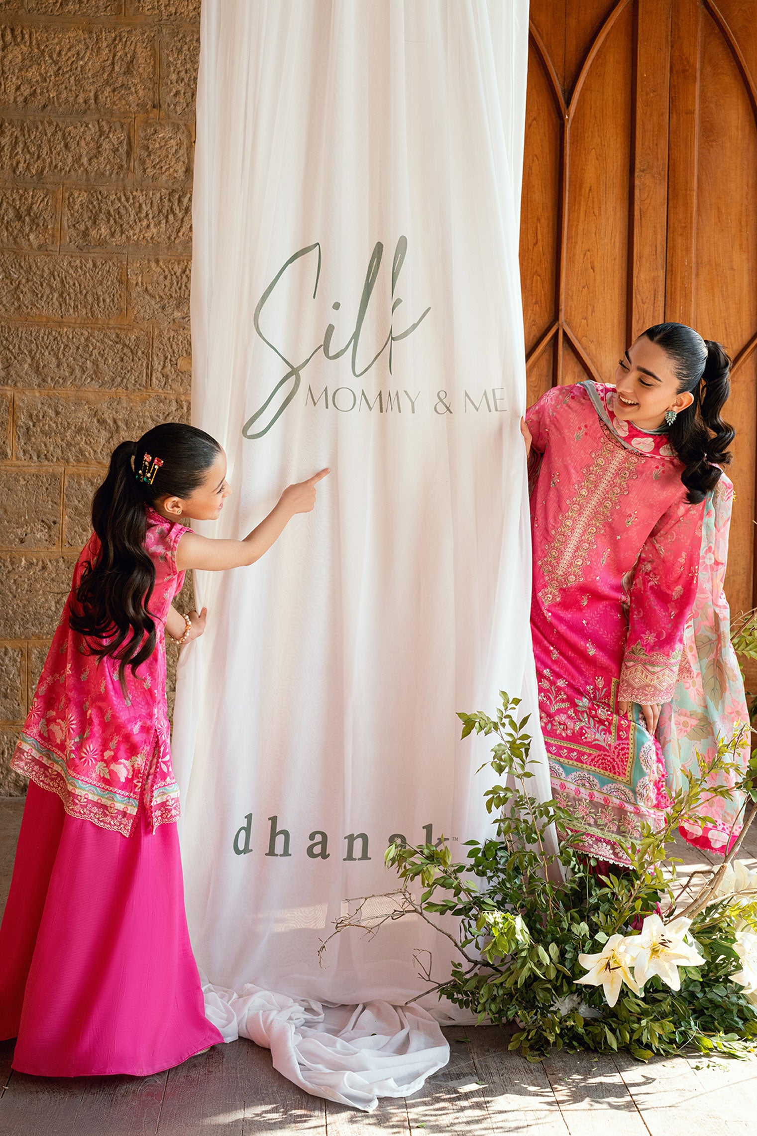 Kids pink 2-piece satin silk outfit with delicate embroidery.