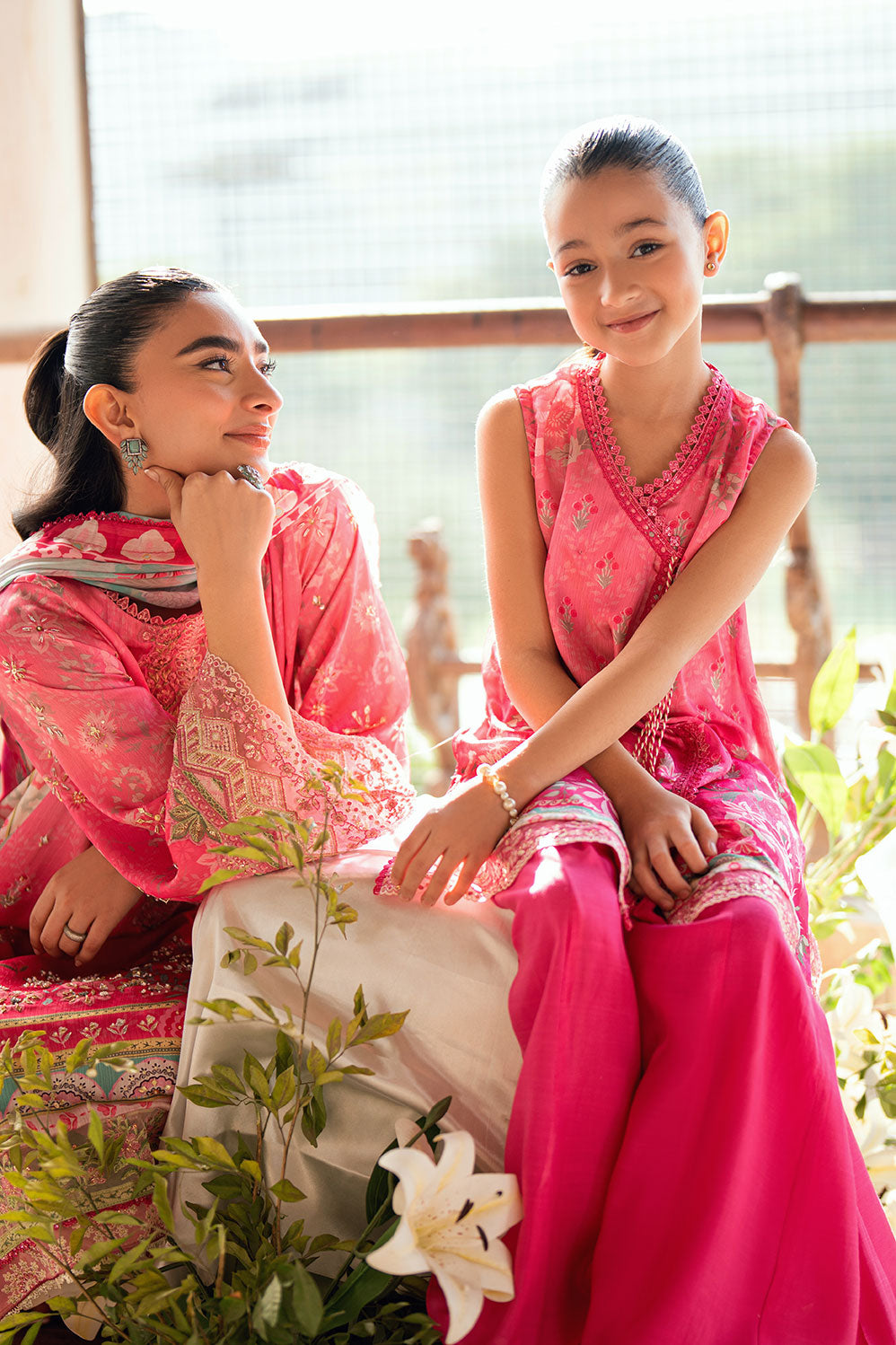 Kids pink 2-piece satin silk outfit with delicate embroidery.