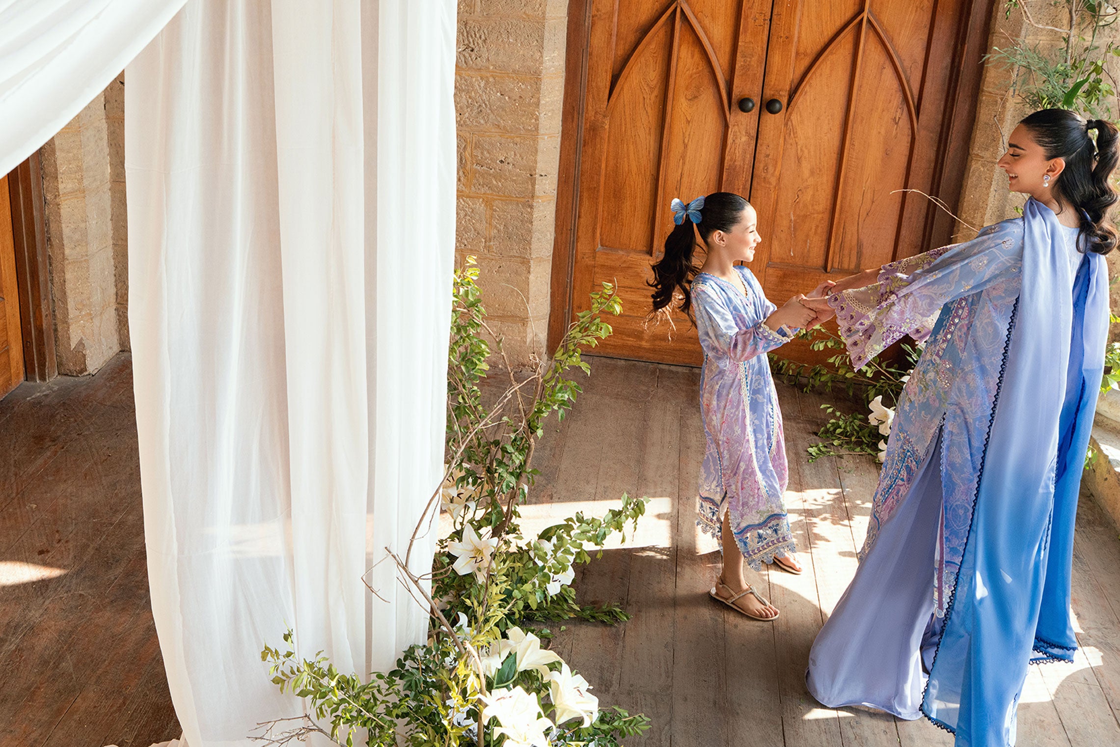 SS26DA-2897 Purple 2-piece crepe silk outfit with a subtle print, delicate hand embellishments, and solid flared pants.