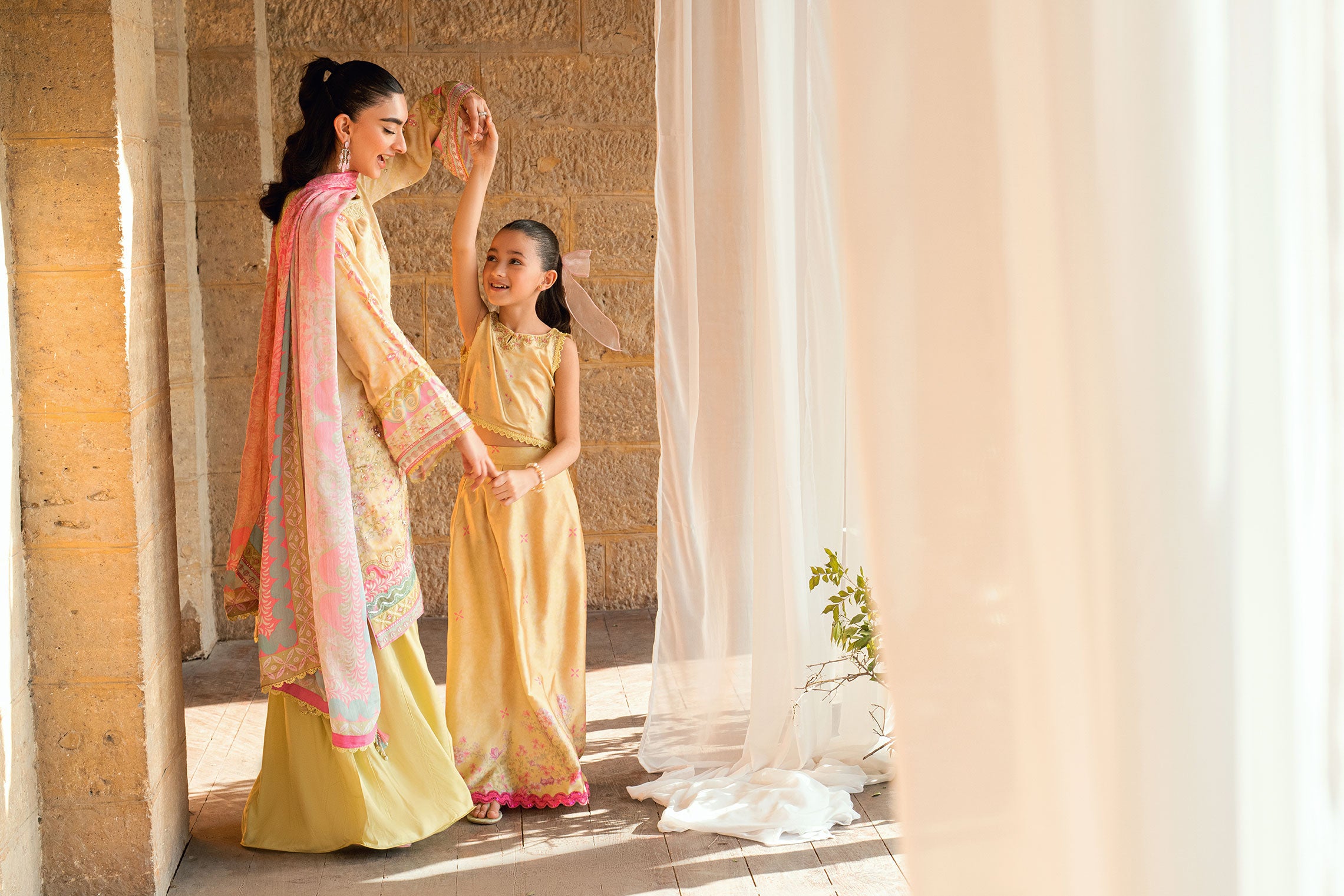 Kids yellow 2-piece shamoz silk set with floral embroidery.