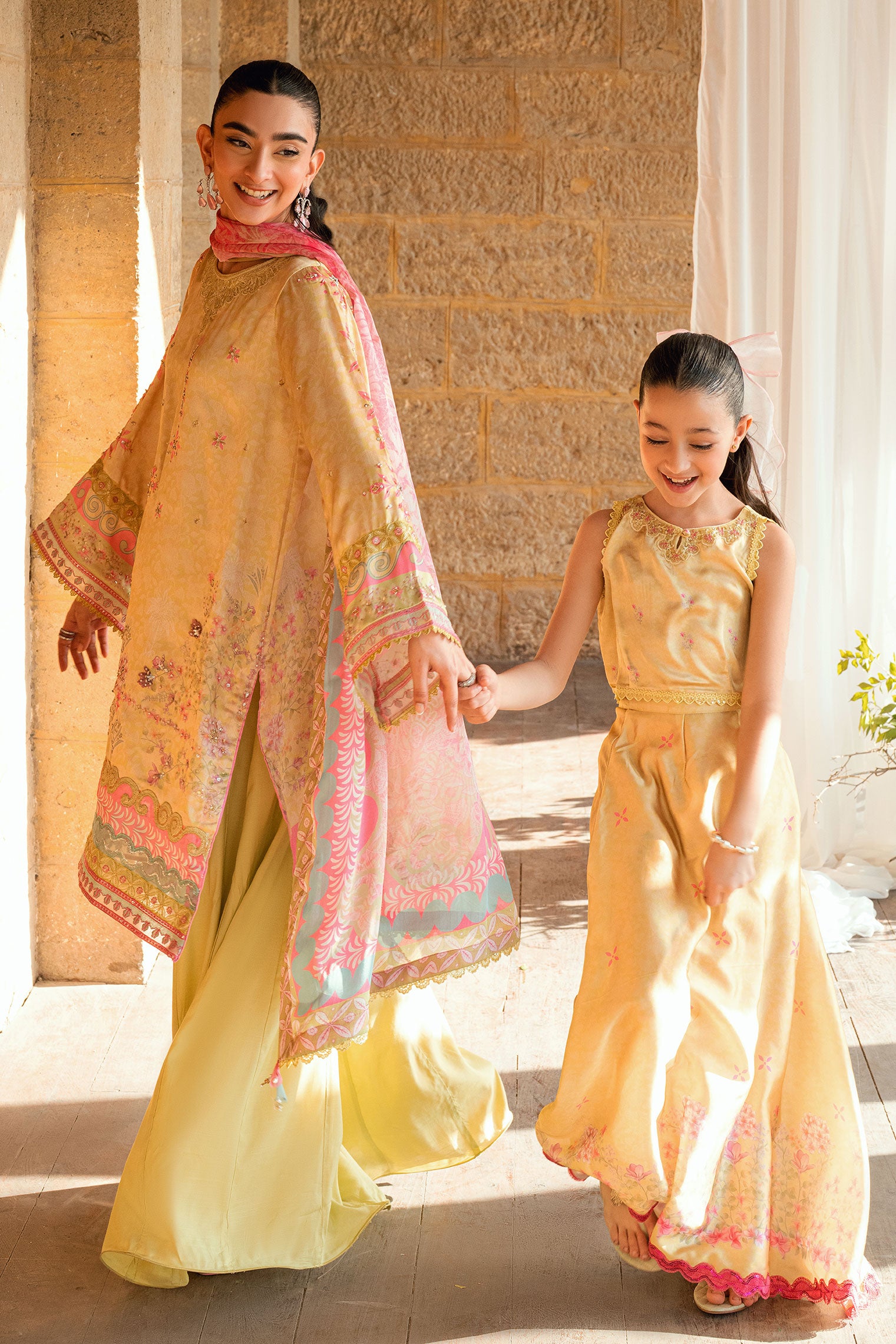 Kids yellow 2-piece shamoz silk set with floral embroidery.