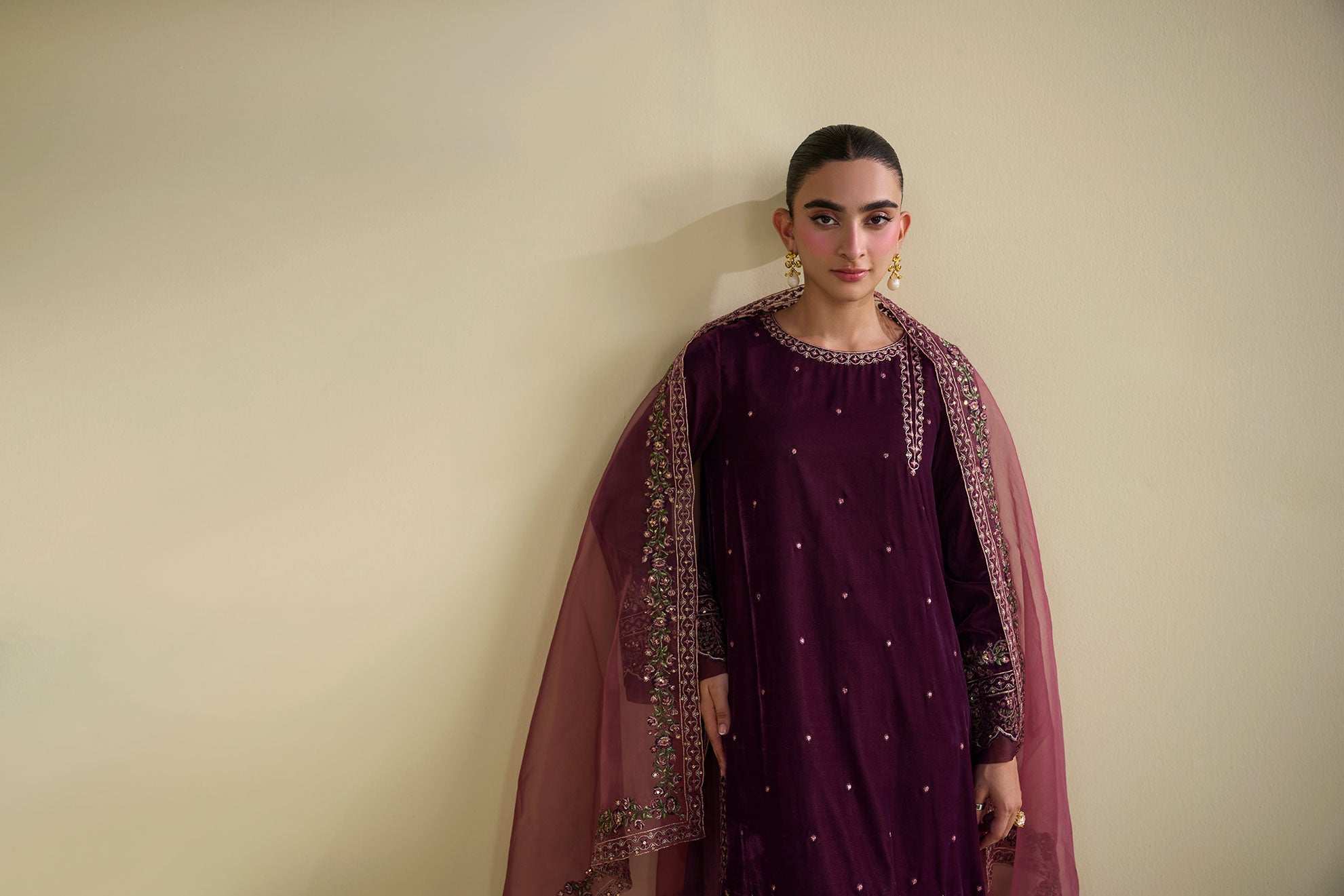 FW25DA-2805 Soft plum velvet shirt with delicate embroidery and subtle embellishments on the hem and sleeves.