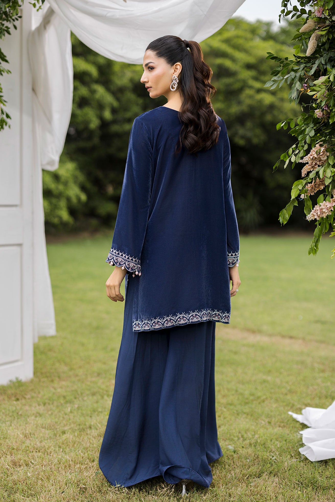 FW25DA-2834 Grey two-piece velvet kurta with ornate embroidery on neckline, sleeves, and hem, paired with flared trousers