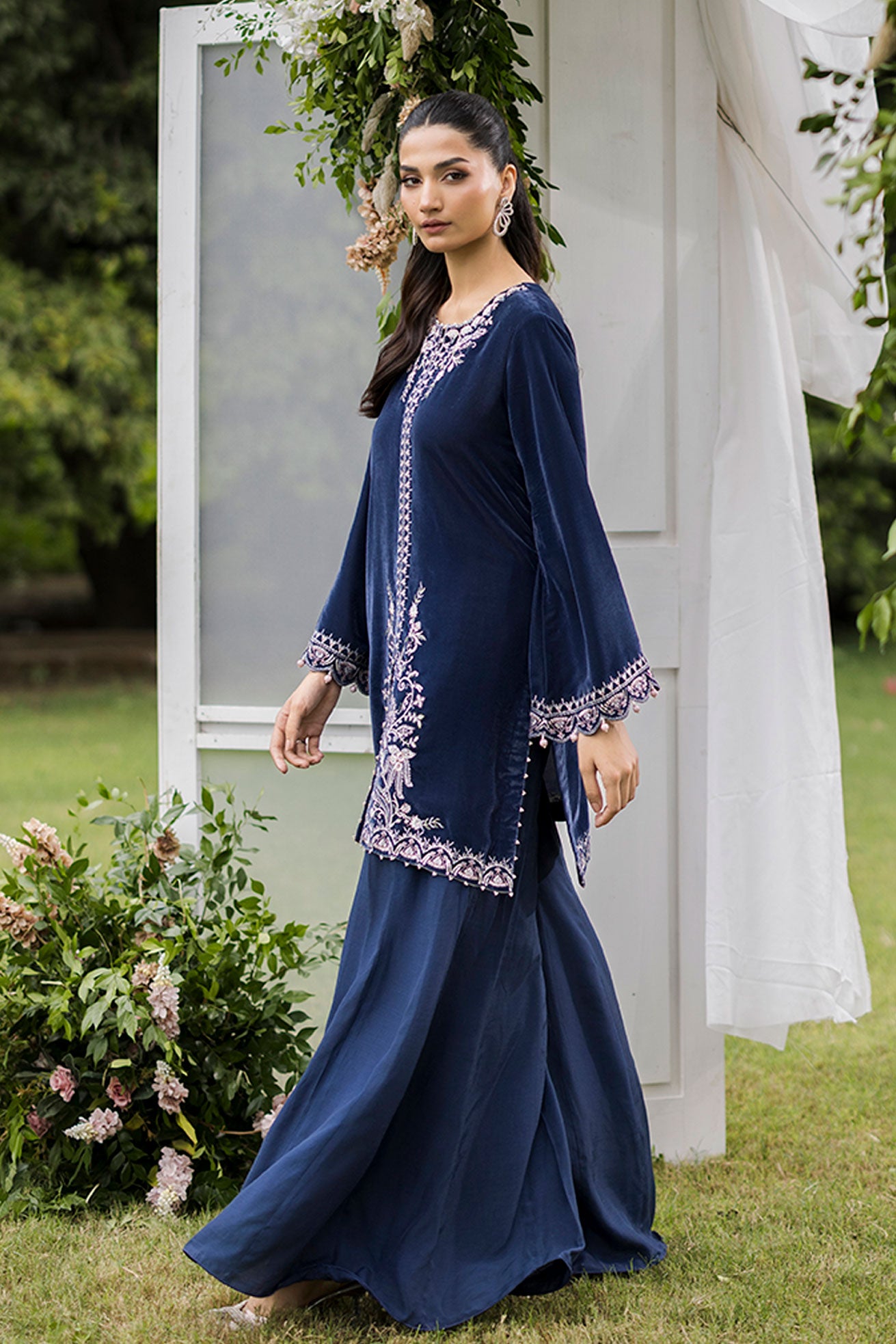 FW25DA-2834 Grey two-piece velvet kurta with ornate embroidery on neckline, sleeves, and hem, paired with flared trousers