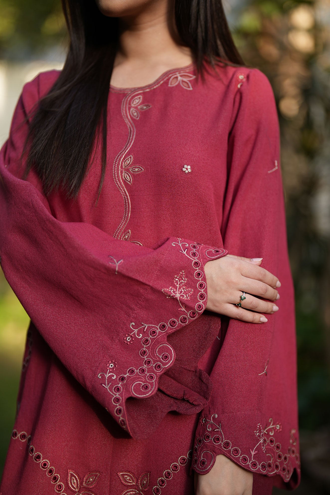 FW25DC-2880 Red 2-piece karandi ensemble featuring delicate embroidery and straight cut trousers.
