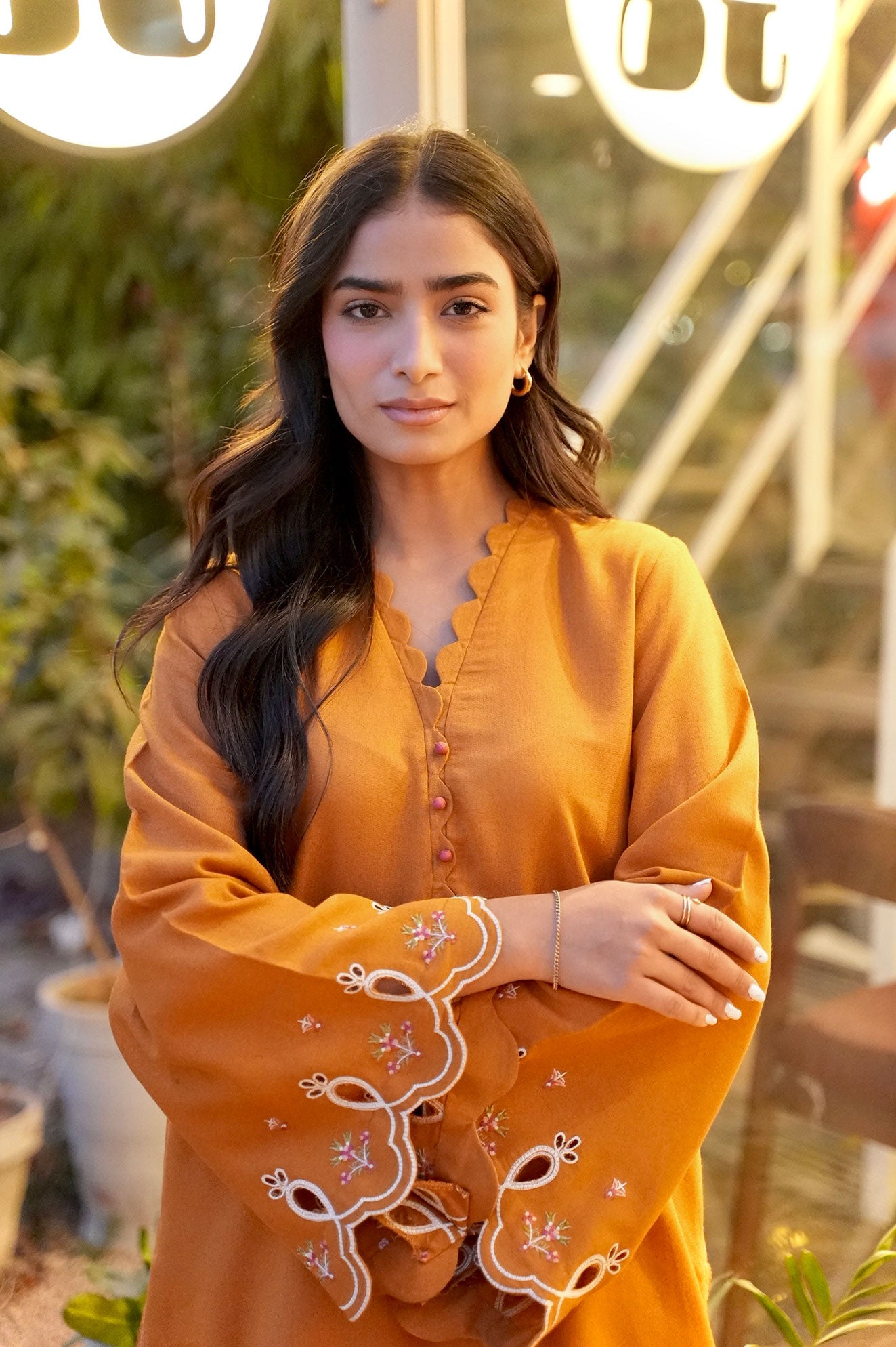 FW25DC-2881 Mustard 2-piece karandi ensemble with white and orange embroidery and scalloped neckline.